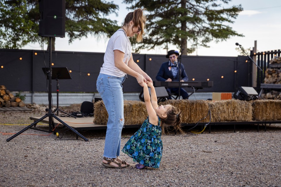 Audience members dance as Van Delorey performs at the Hay Days youth showcase on July 23, 2025. Ollie Williams/Cabin Radio