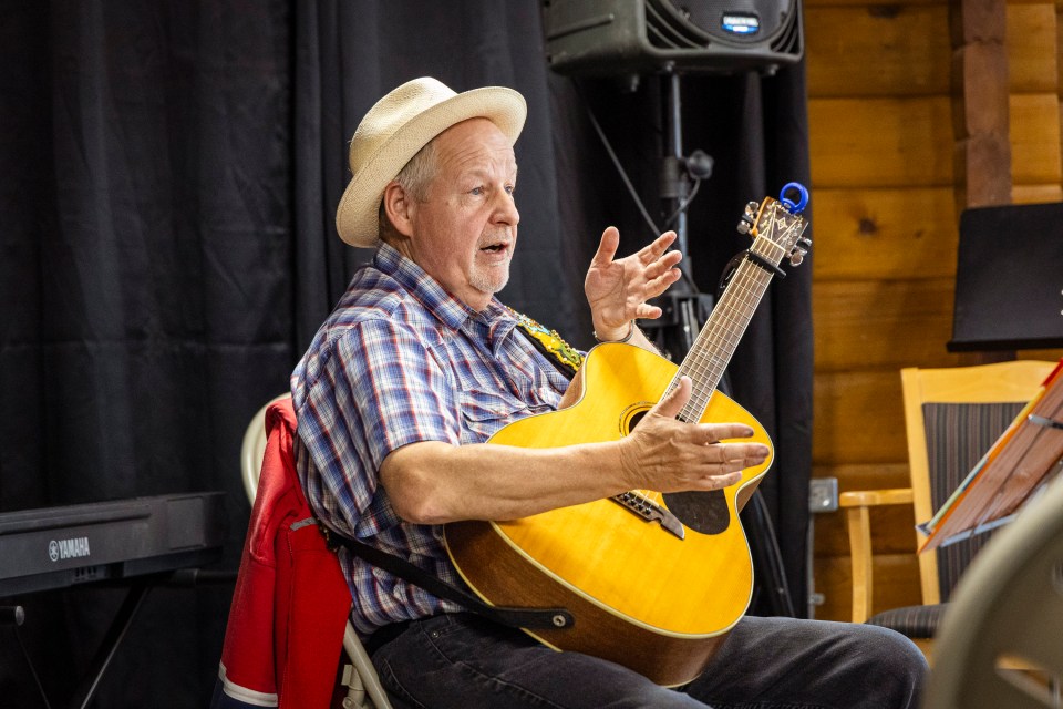 Norm Glowach, under the name Nick Nackers, performs at a Hay Days music night at the Old Zoo. Ollie Williams/Cabin Radio