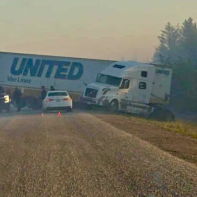 A tractor trailer across Highway 3 early on August 5, 2025. Photo: Rae Villebrun