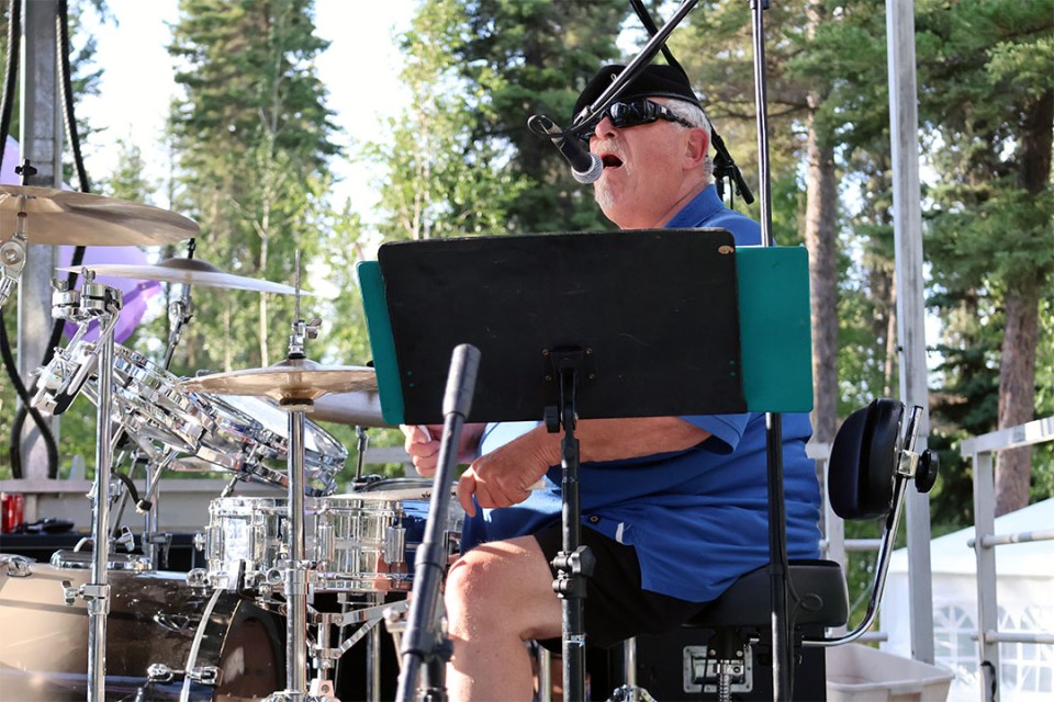 Drummer sings on stage