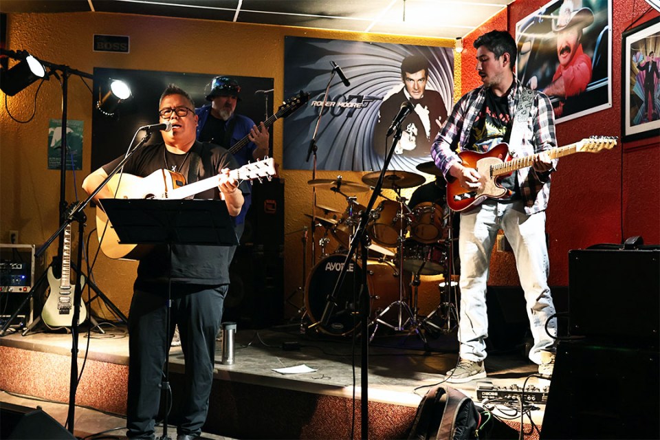 Band performing on stage.