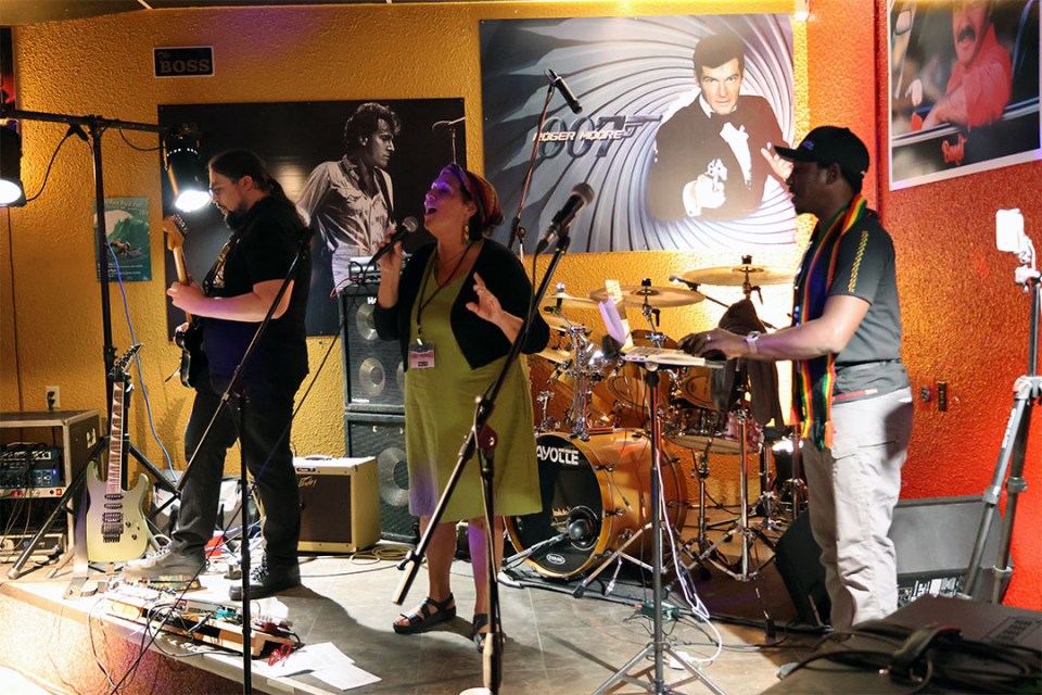 Trio perform on stage