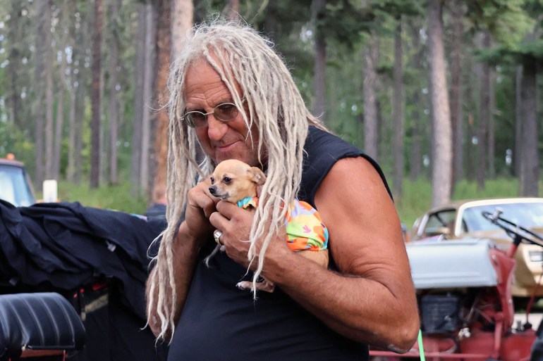Mike Hall, of TV show Rust Valley Restorers, posed for photos with fans, kids – and dogs. Miriam Bosiljevac/Cabin Radio