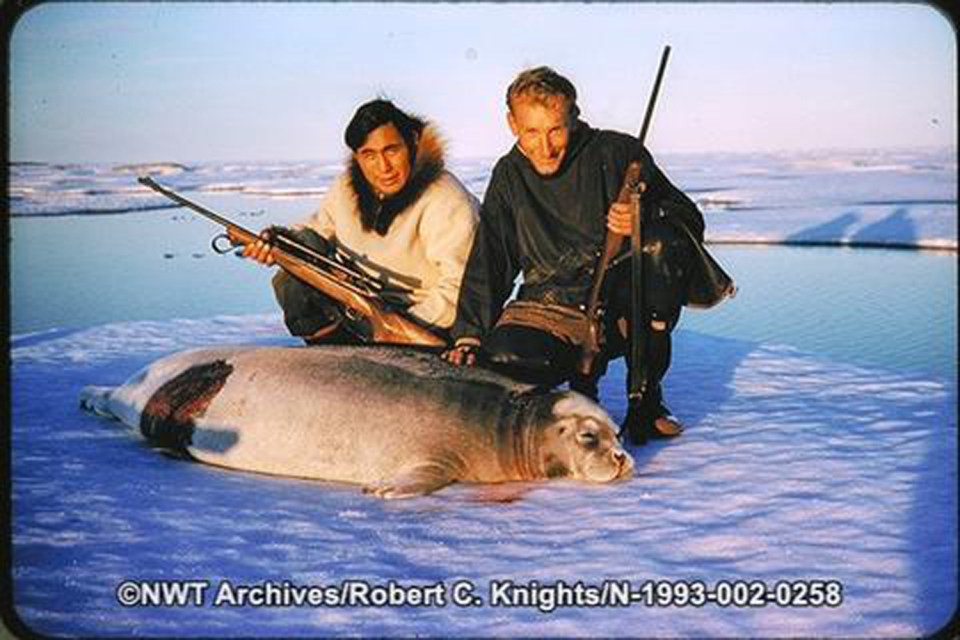 Peter Esau, left, and Bob Knights seal hunting outside Sachs Harbour in 1958. NWT Archives/Robert C. Knights fonds/N-1993-002: 0258