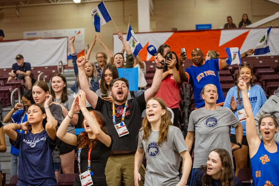 Members of the NWT's female basketball team joined parents, other coaches and fans in celebrating. Ollie Williams/Team NT