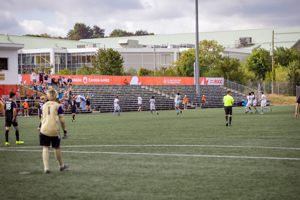 Team NT players celebrate with fans at the King George V stadium in St John's. Ollie Williams/Team NT