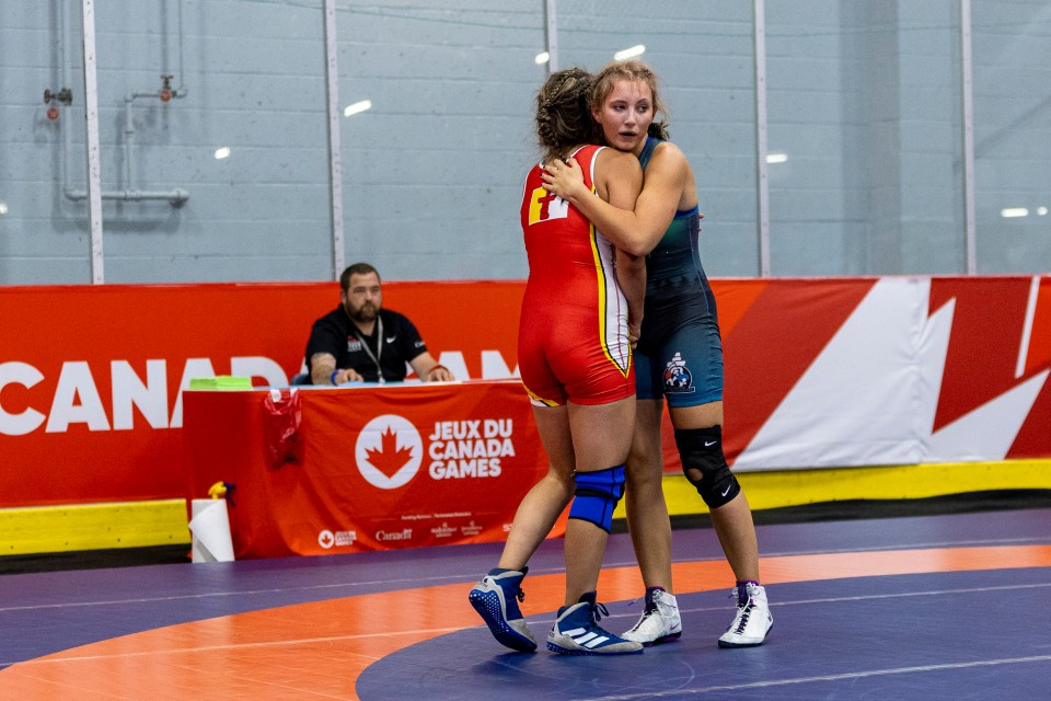 Pedersen and Ford embrace after their contest. Ollie Williams/Team NT