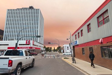Wildfire smoke over Yellowknife on August 27, 2025. Ollie Williams/Cabin Radio
