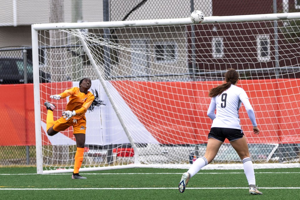 Orlee Duru, who was Team NT's flagbearer at the closing ceremony, became the soccer team's stand-in goalkeeper after an injury to Daphnee Babiuk. Here, she tipped a shot onto the bar against Manitoba.