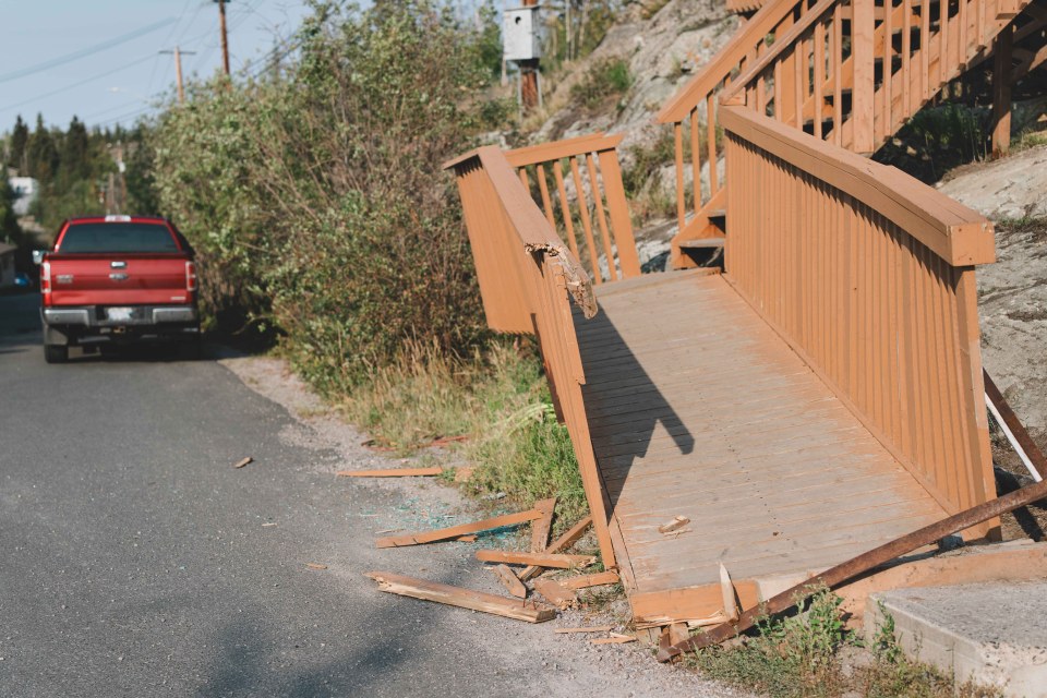 A red truck pulls over after hitting the ramp at the base of Pilot's Monument. Sarah Pruys/Cabin Radio