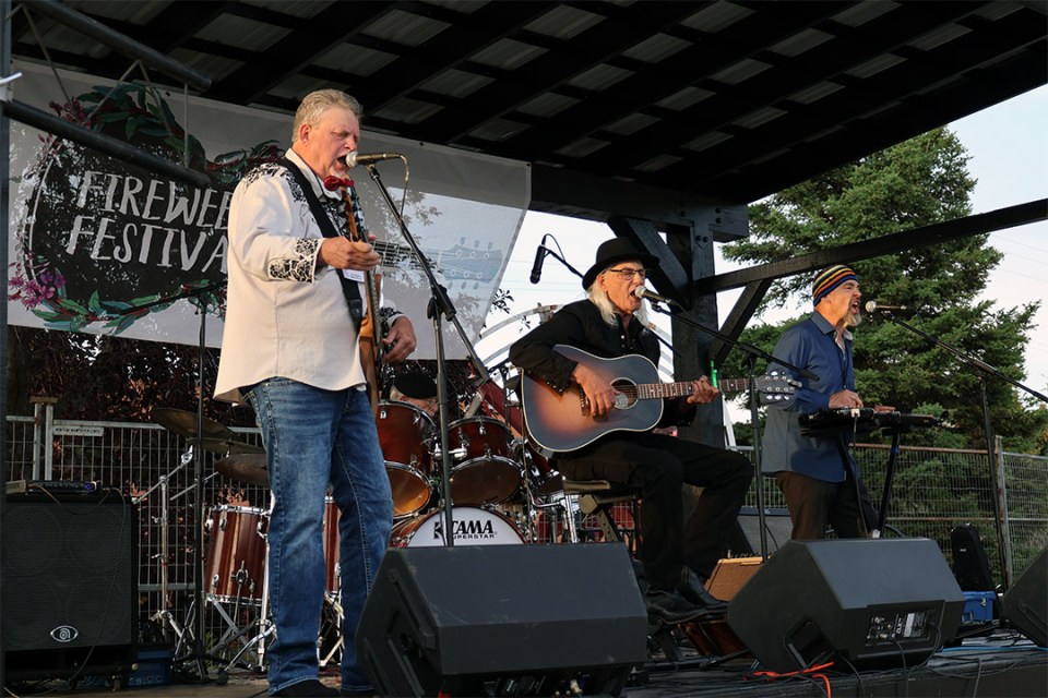 Musicians singing on stage