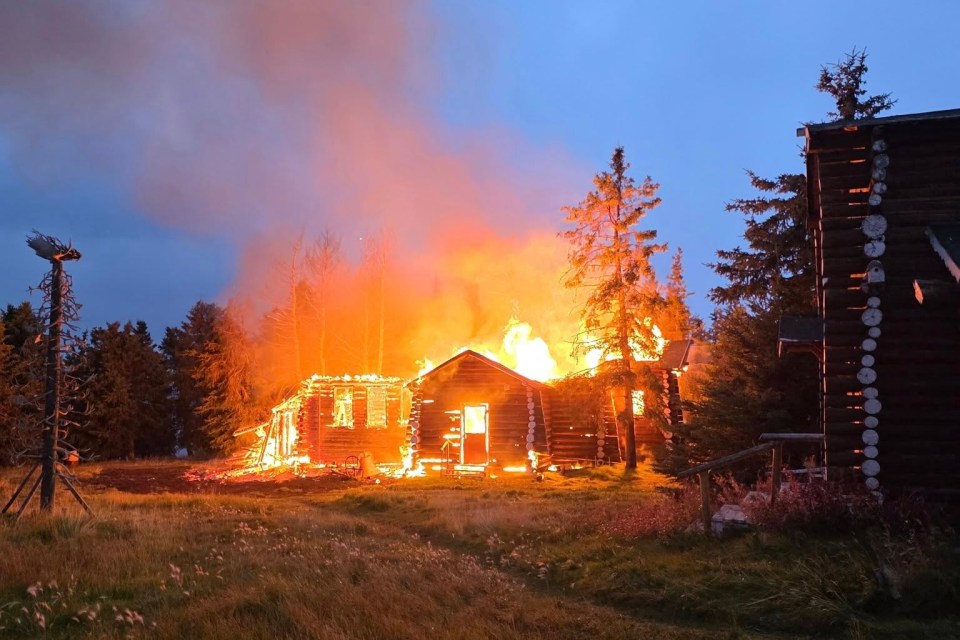 Colville Lake's church is seen consumed by flames on the morning of September 16, 2025. Photo: Joey Kochon