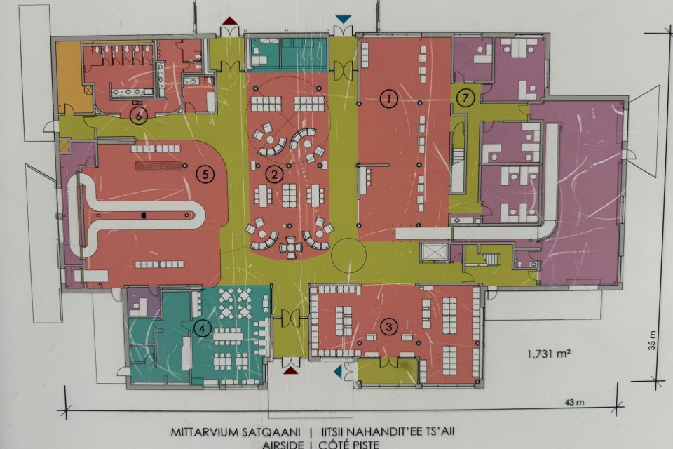 A proposed layout of Inuvik's new terminal, as seen in a billboard at the airport that was already several years old in 2025. Ollie Williams/Cabin Radio
