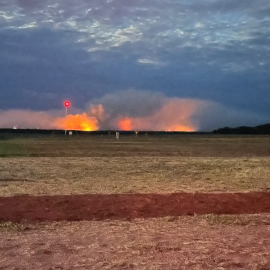 The glow of wildfire FS014 is seen from Fort Simpson on Saturday, September 6. Photo: David Myre