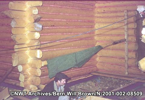 Brown working on the church floor in 1964. NWT Archives/Bern Will Brown fonds/N-2001-002: 08509