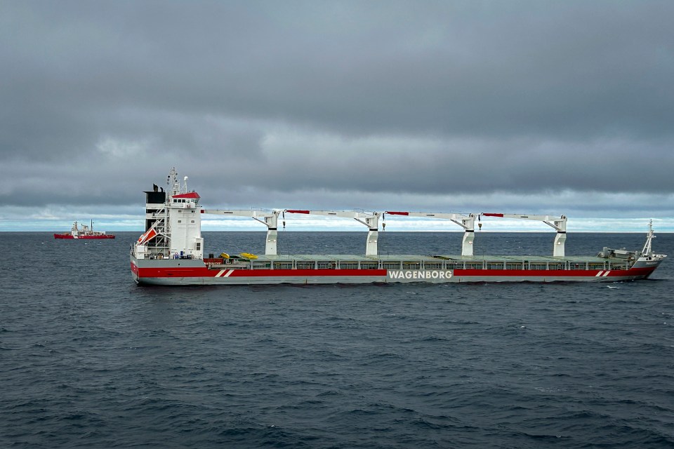 A Canadian Coast Guard ship, left, alongside the Thamesborg in the Northwest Passage. Photo: Canadian Coast Guard