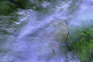 A false-colour Sentinel-2 satellite image shows hotspots from fire FS014 on September 12, 2025.