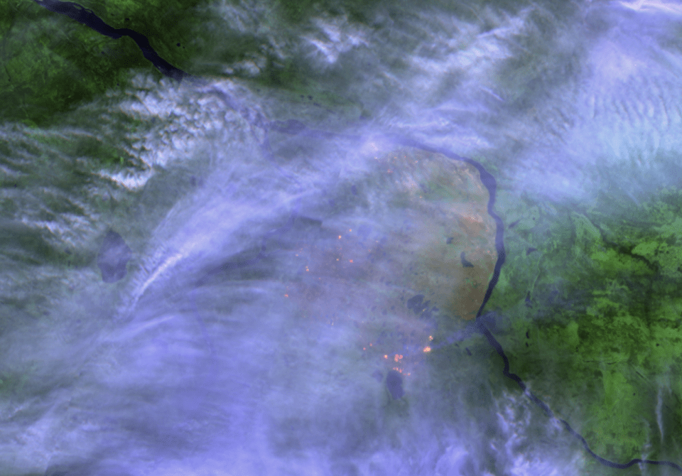 A false-colour Sentinel-2 satellite image shows hotspots from fire FS014 on September 12, 2025.