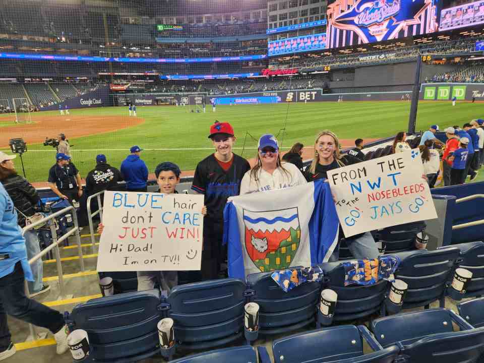 Evan Cockney, Jett Etter, Meghan Etter-Cockney and Tamara Hansen attended a Toronto Blue Jays World Series game. Photo: Meghan Etter-Cockney