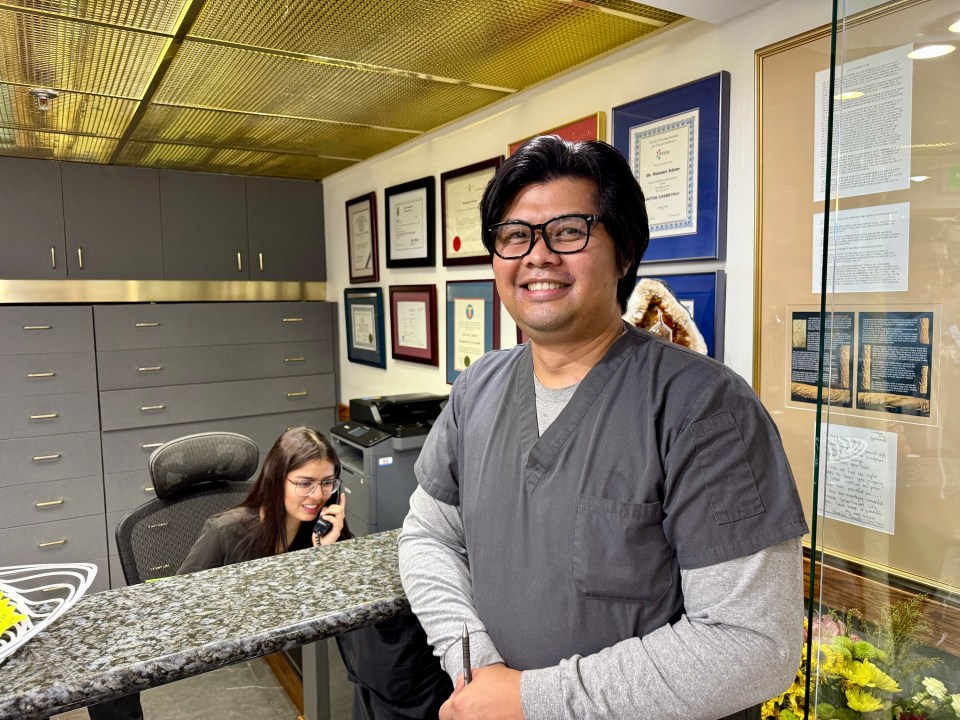 Ryan Polintan, a receptionist at Adam Dental Clinic, said he helped repel three attackers. Ollie Williams/Cabin Radio
