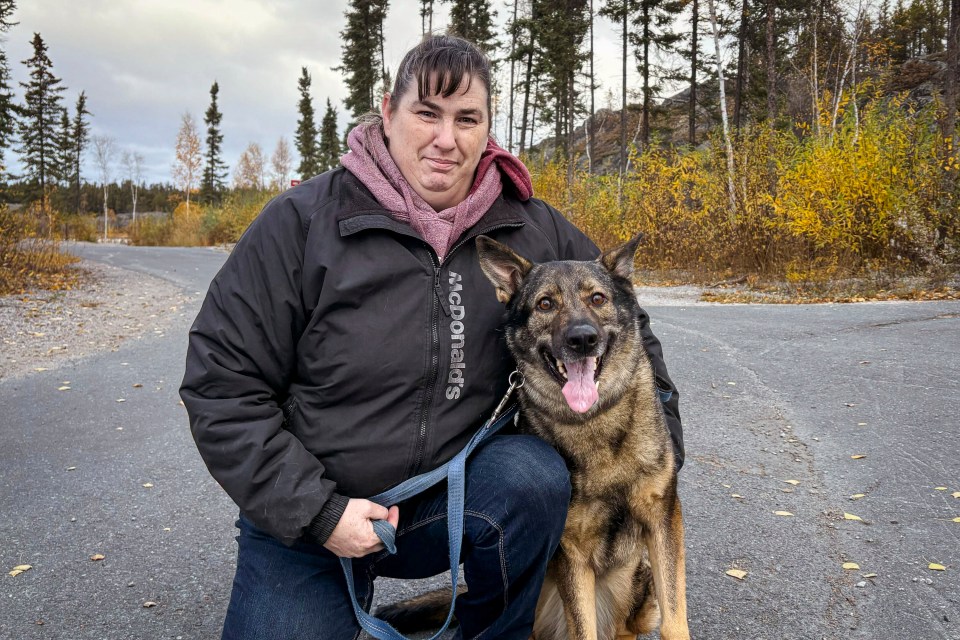 Vanessa Rolph with her dog. Jasmine Nasogaluak/Cabin Radio