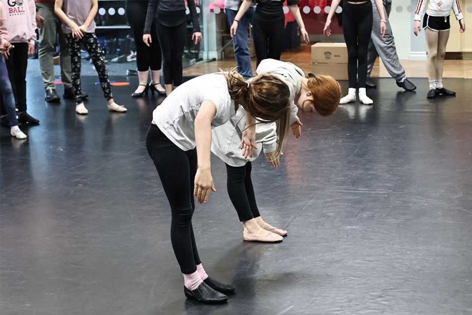 Two children rehearse a ballet