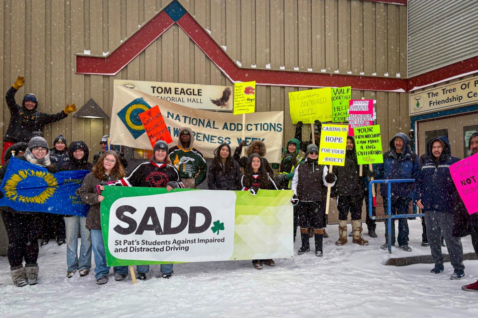 Wellness walk participants outside the Tree of Peace Friendship Centre. Jasmine Nasogaluak/Cabin Radio