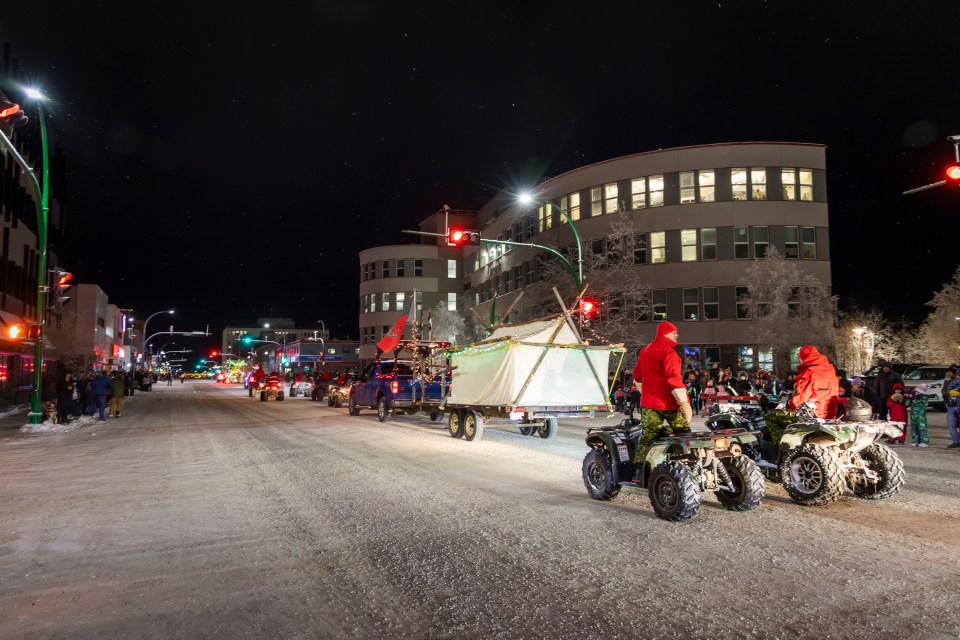 The Canadian Rangers pass by a downtown Yellowknife federal building during the parade. Ollie Williams/Cabin Radio