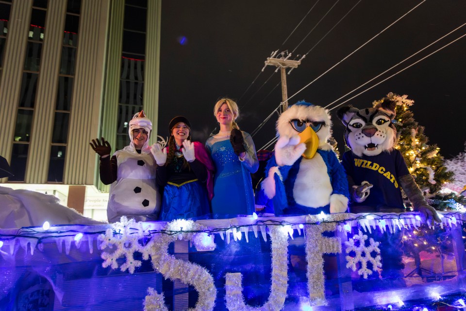 Cast members from Sir John's performance of Frozen aboard the school's float. Ollie Williams/Cabin Radio
