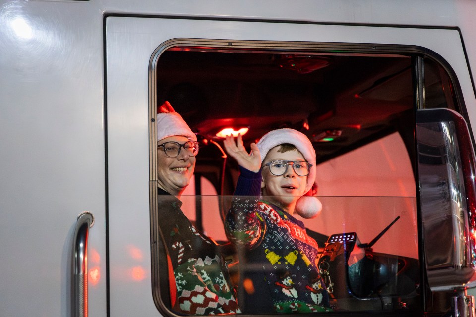 One of the best seats in the house: inside a city fire truck just ahead of Santa's sleigh. Ollie Williams/Cabin Radio