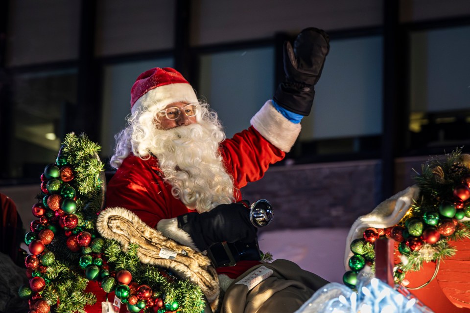 A final wave to downtown Yellowknife. Members of Santa's delegation said he had several other engagements worldwide planned over the next month. Ollie Williams/Cabin Radio