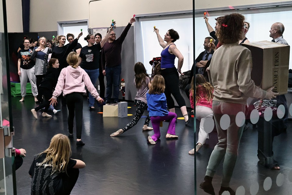 Rehearsal at a dance studio with adults and children