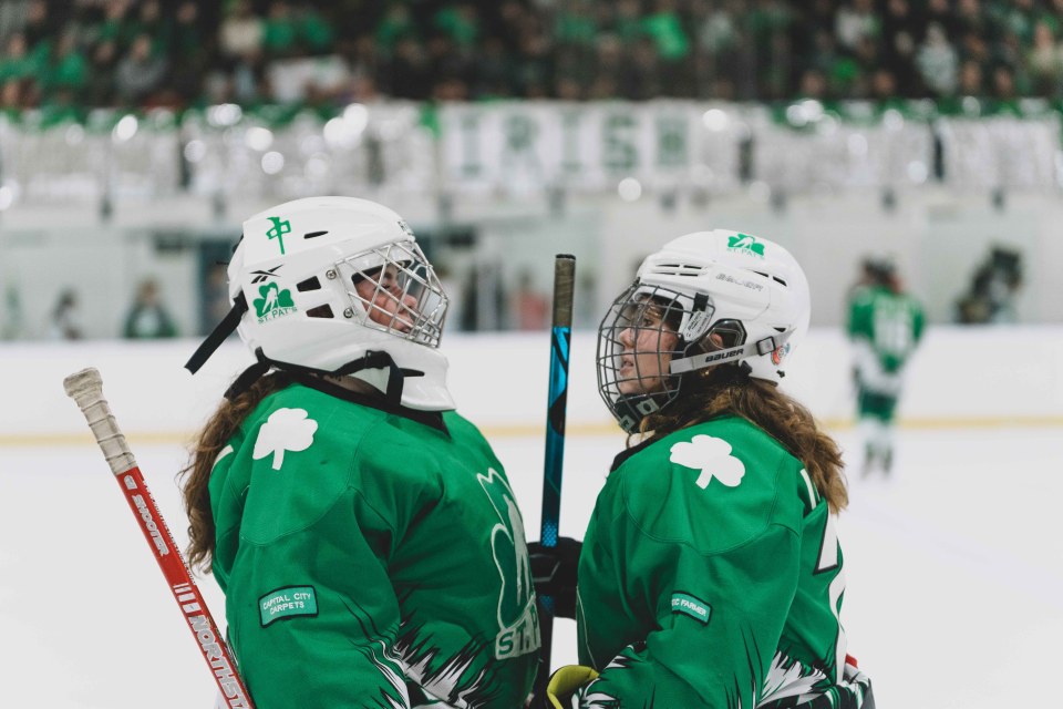 The St Pats goalies chat at the end of a tough period. Sarah Pruys/Cabin Radio