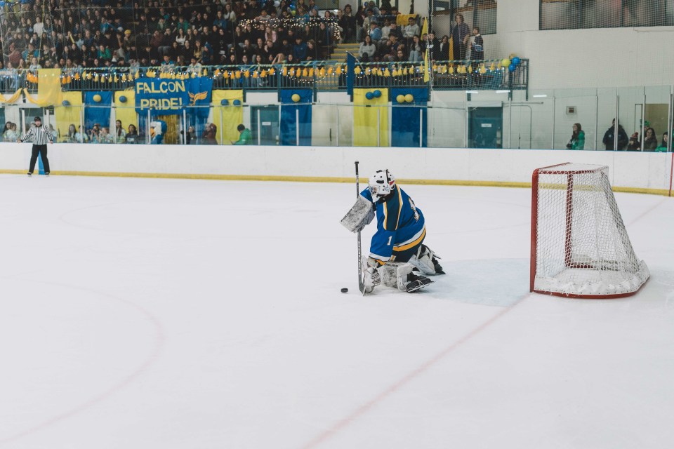 Goalie Griffin Jones of the Sir John's team stops the puck. Sarah Pruys/Cabin Radio