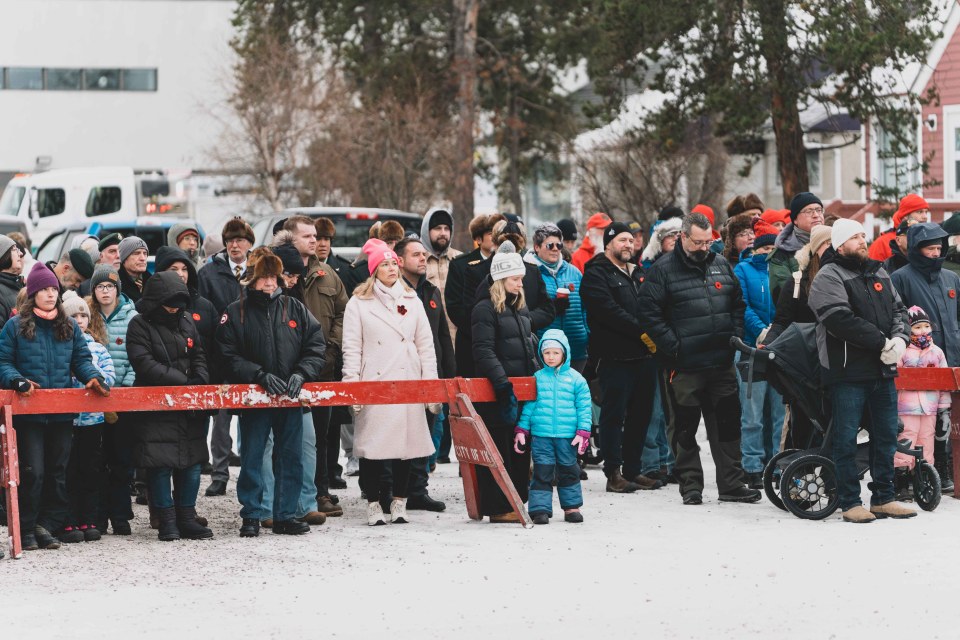 Yellowknife residents watch the Remembrance Day outdoor ceremony. Sarah Pruys/Cabin Radio