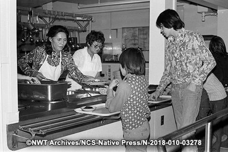 Students in a café in Fort Simpson. NWT Archives/Native Communications Society fonds - Native Press photograph collection/N-2018-010: 03278