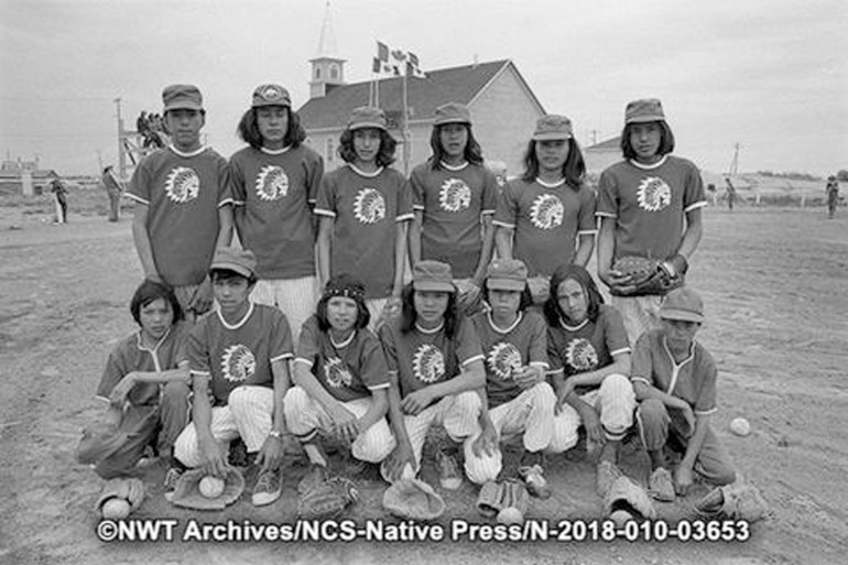 The Rae All-Stars baseball team in 1976. Names are given by the NWT Archives. Top row from left: Leon Football, Don Camsell, Ernie Zoe, Frank Michel, Narcisse Rabesca, Dennis Camsell. Bottom row: Peter Adzin, James Lafferty, Joe Zoe, Gabriel Dryneck, Peter Zoe, John Lafferty, Alphonse Thomas. NWT Archives/Native Communications Society fonds - Native Press photograph collection/N-2018-010: 03653