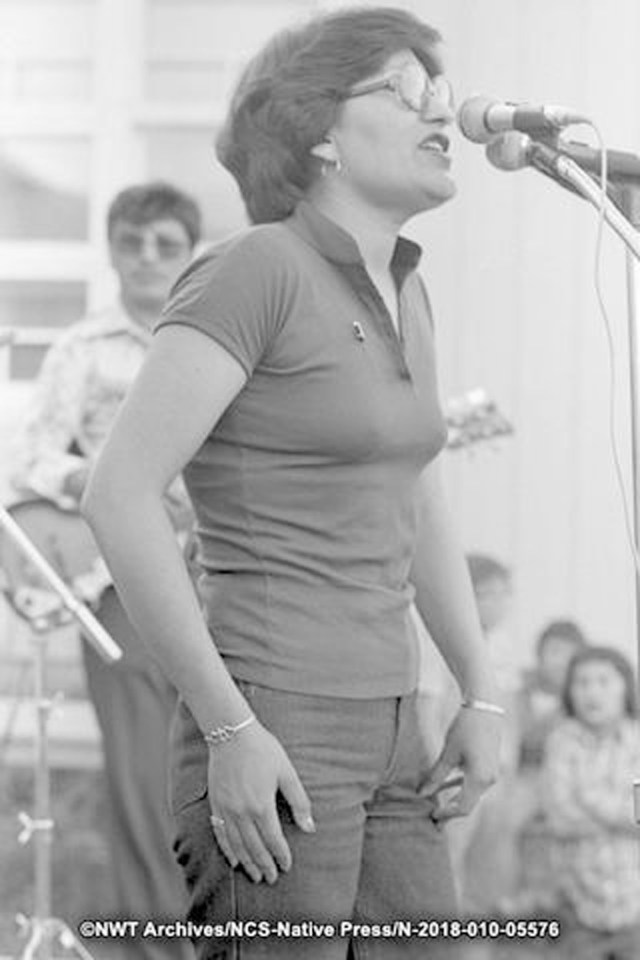 Singer Edith Lafferty at the Métis Association's sixth Annual General Assembly, held in Fort Simpson. Tessa Macintosh/NWT Archives/Native Communications Society fonds - Native Press photograph collection/N-2018-010: 5576