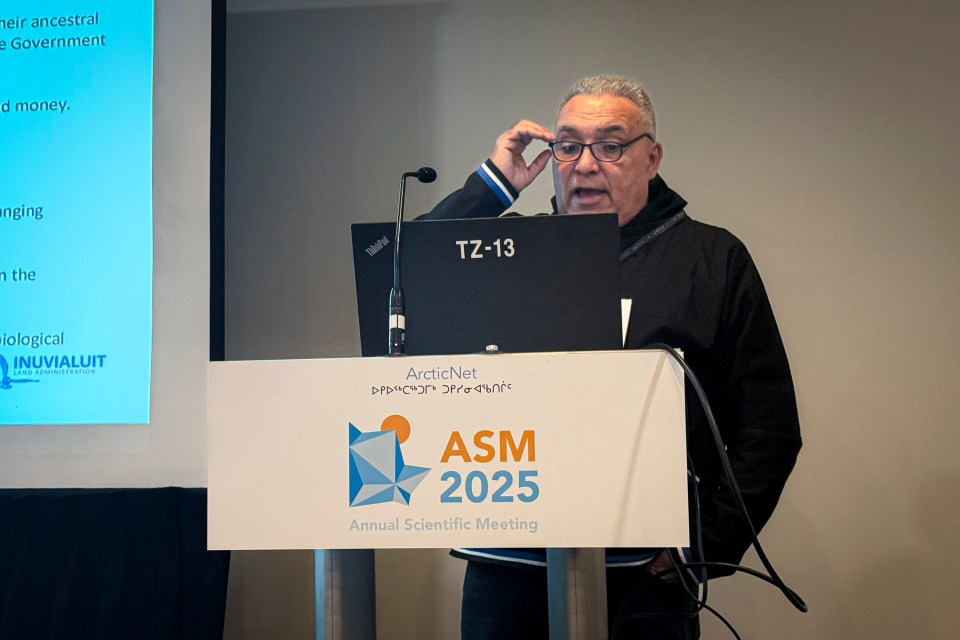 Charles Klengenberg presents at the ArcticNet conference on December 16, 2025. Ollie Williams/Cabin Radio