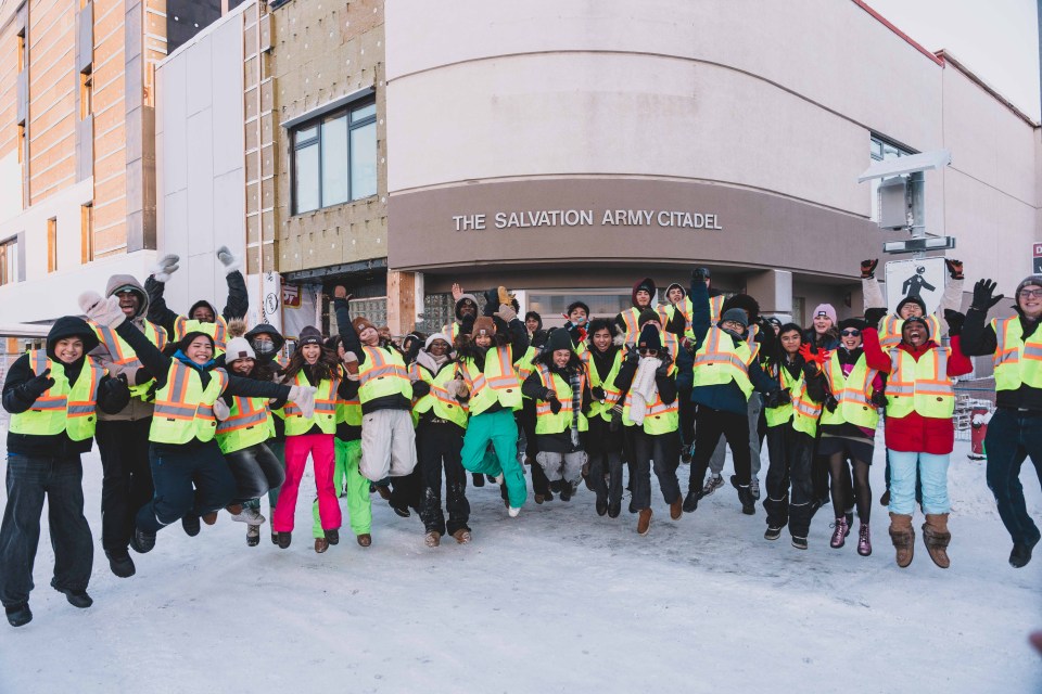 St Pat's student volunteers cheer after wrapping up Operation Christmas 2025. Sarah Pruys/Cabin Radio