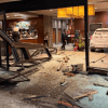 A submitted image of a car at rest inside the foyer of the Explorer Hotel.