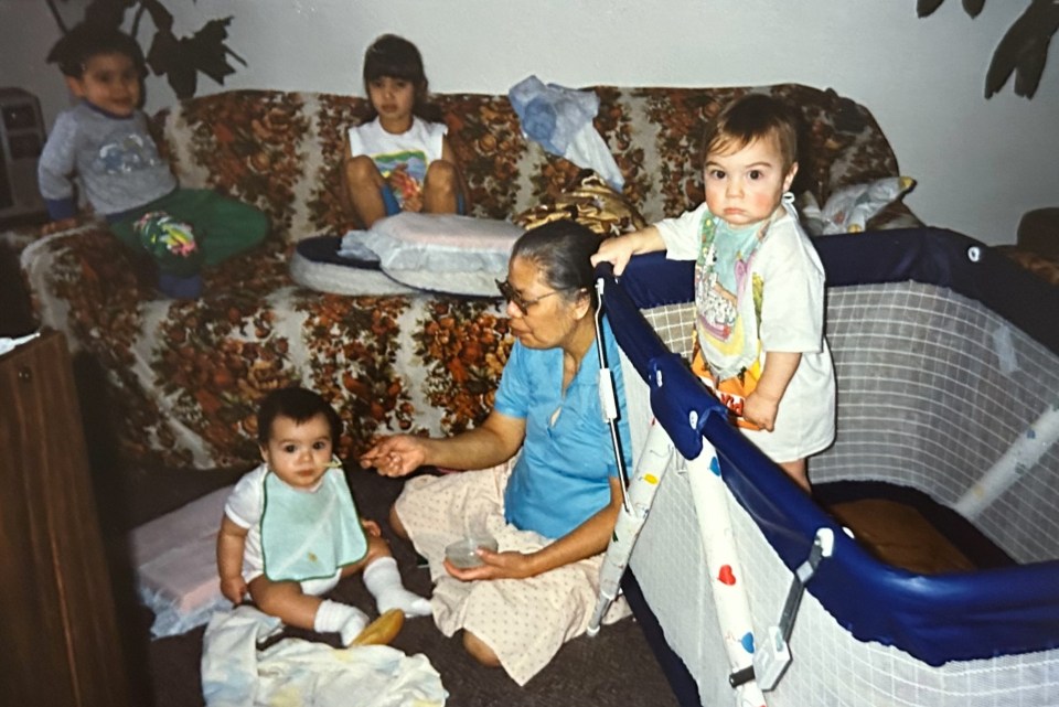 Juanita babysitting in her apartment at Northern United Place. Photo submitted by Jovi Yip