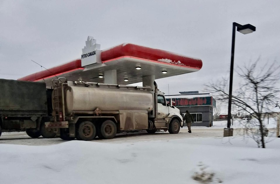 A fuel truck with the military convoy at a gas station in High Level, Alberta. Photo: Bobby Clement