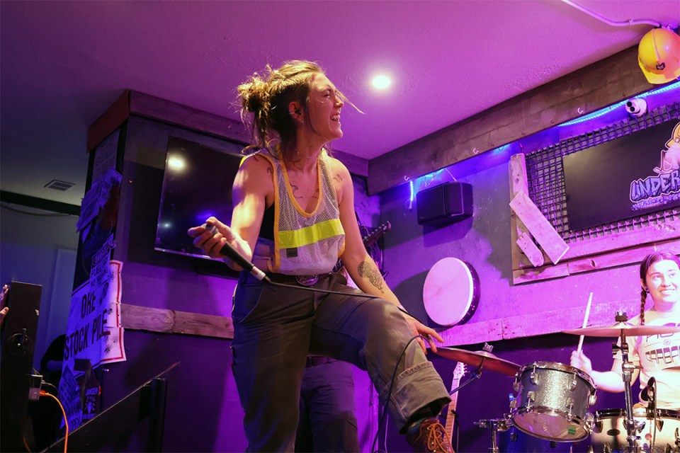 Woman performs on stage