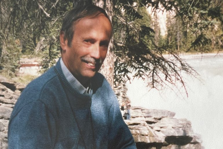 A submitted photo of Bruce enjoying nature at the falls near Hay River in 2006.