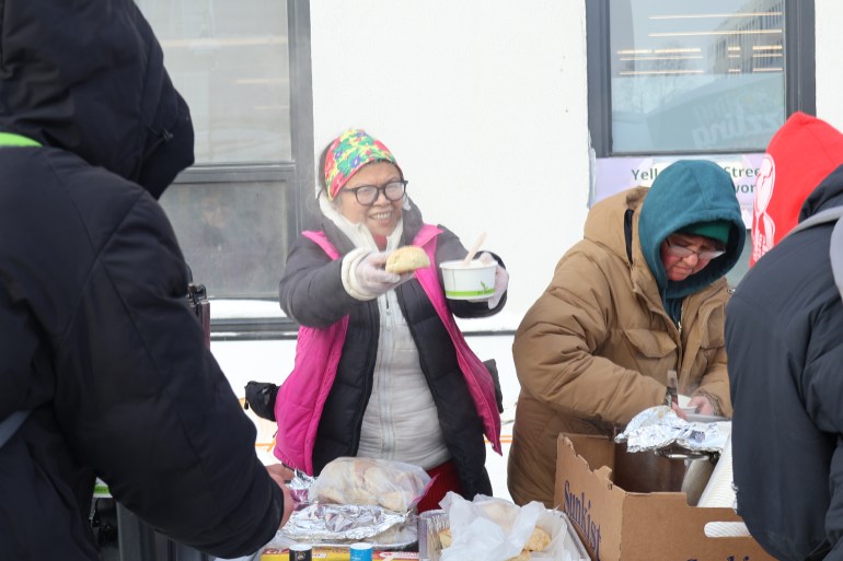 Yellowknife Street Support Network members served soup and bannock to residents on Friday. Aastha Sethi/Cabin Radio