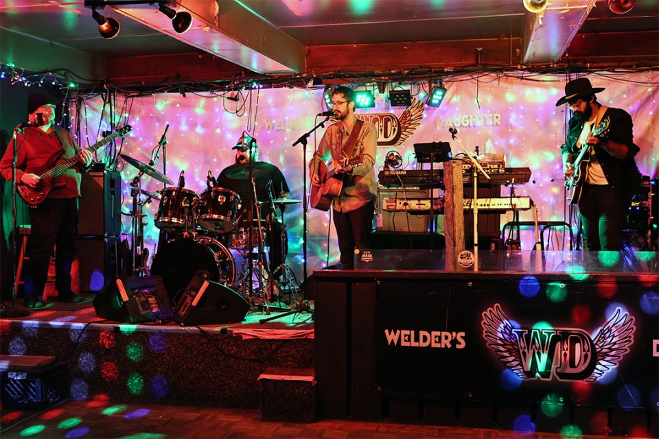 A band performs on stage