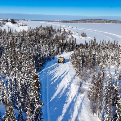 An armoured vehicle on a portage north of Yellowknife during an Operation Nanook-Nunalivut training exercise on February 19, 2026. Ollie Williams/Cabin Radio