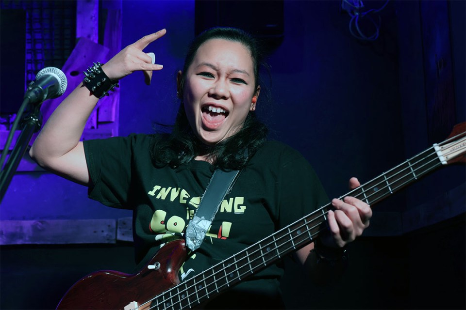 Basist performing on stage