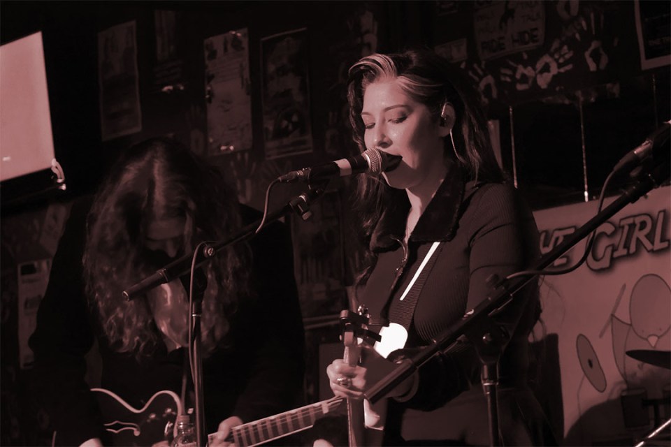 Woman performs on stage